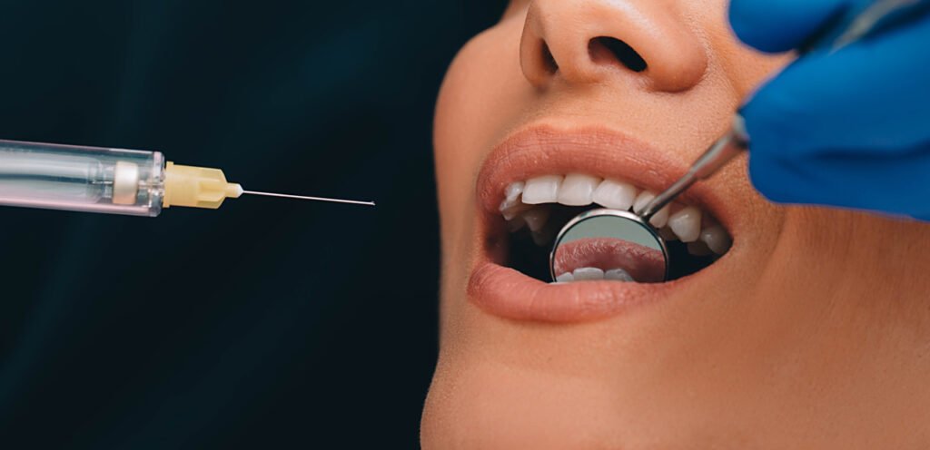 dental procedure close up with mirror and needle 2026 03 09 02 57 20 utc 1